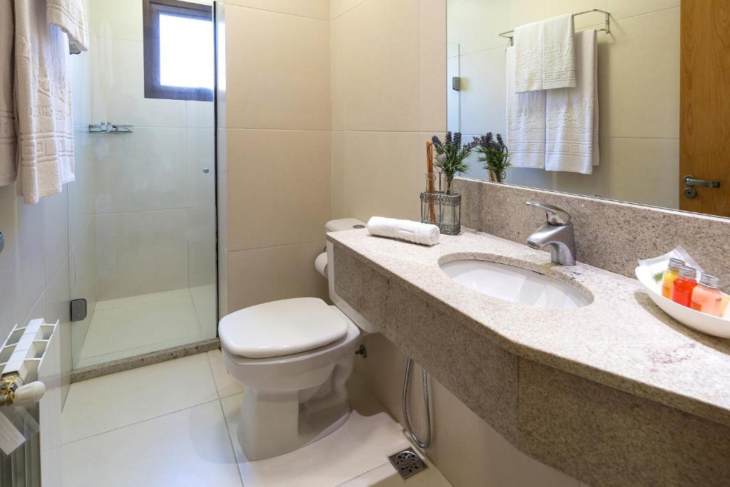 Апартаменты с красивым видом из окна в Vila Suzana Parque Hotel
