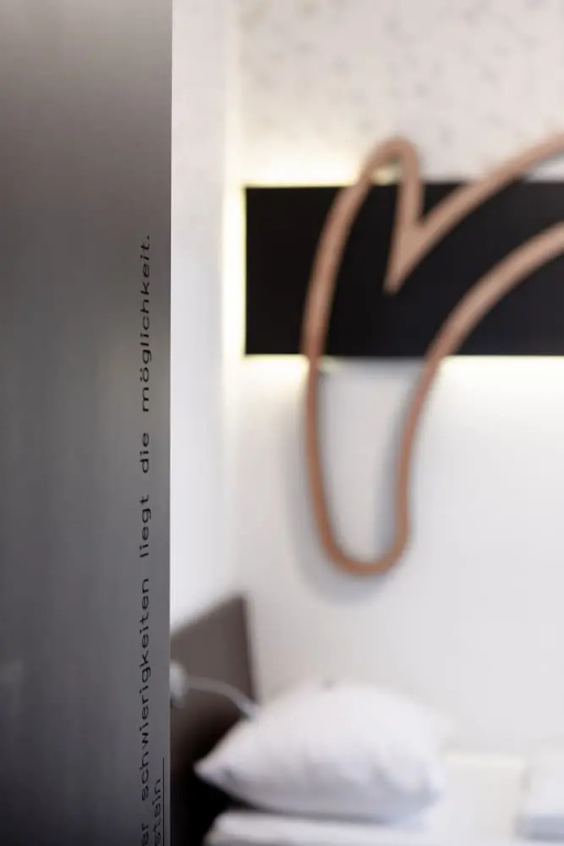 H+ Hotel Ried - Chambres