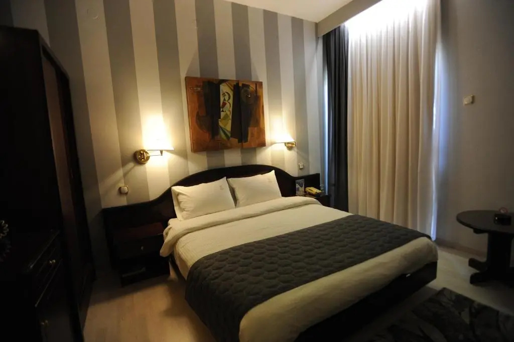 Lingos Hotel - Chambres