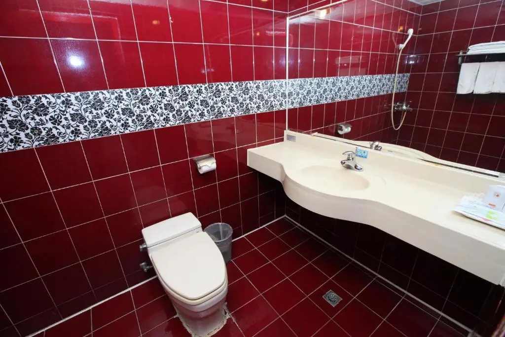 Jiuning Business Hotel - Chambres