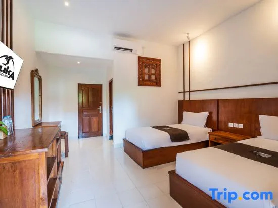 Suka Beach Inn - Chambres