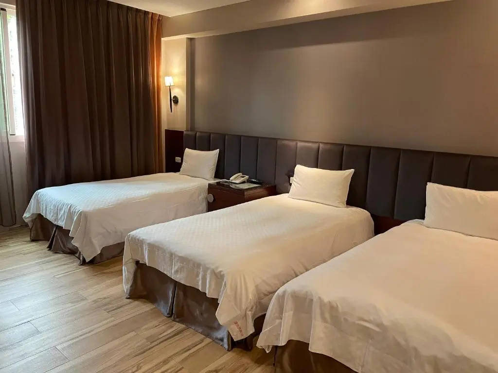 Chia Shih Pao Hotel - Chambres