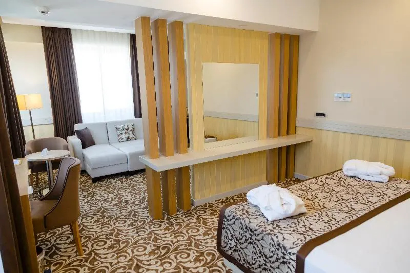 Grand Itimat Hotel - Chambres