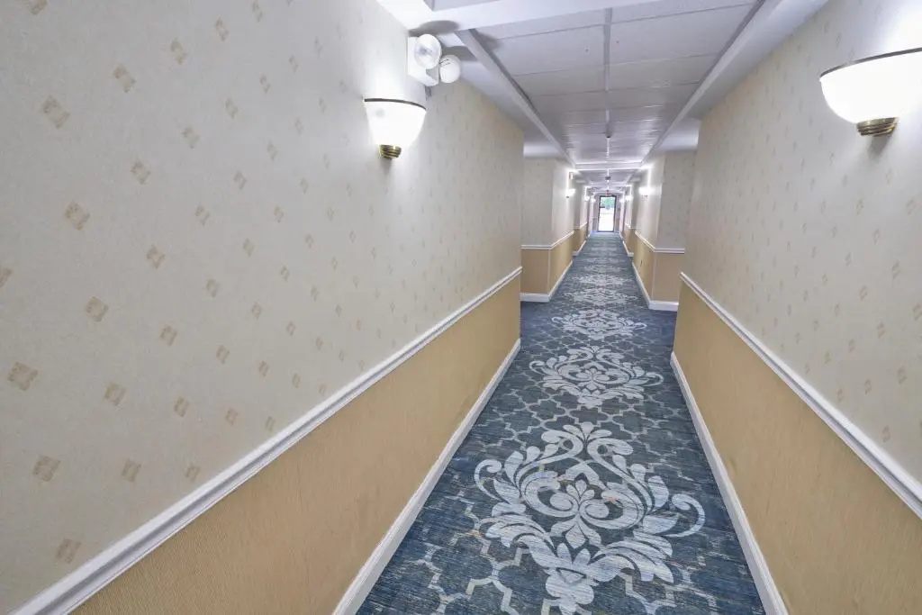 Ambassador Inn & Suites - Chambres