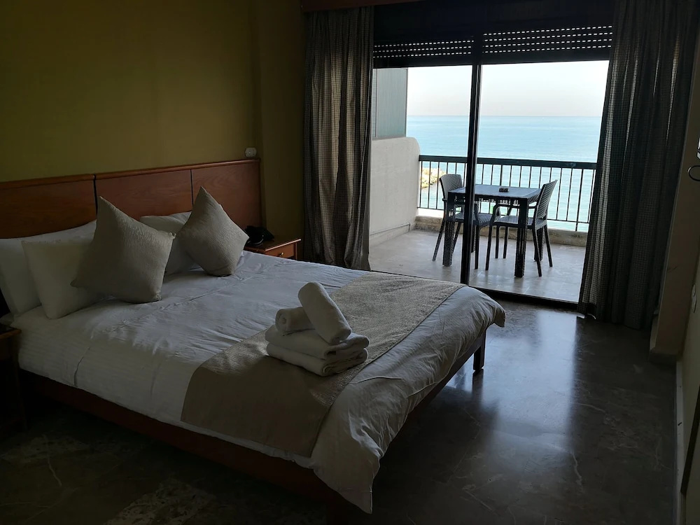 Holiday Suites Hotel And Beach - Chambres