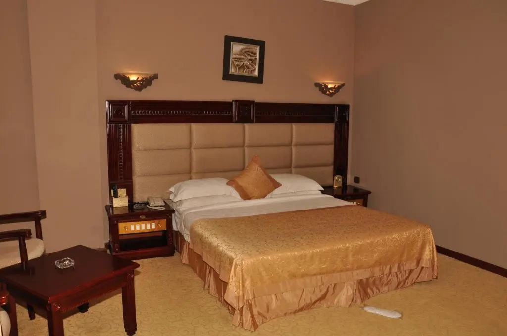 Friendship International Hotel - Chambres