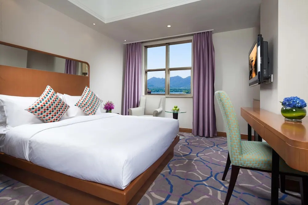 Huachen International Hotel - Chambres