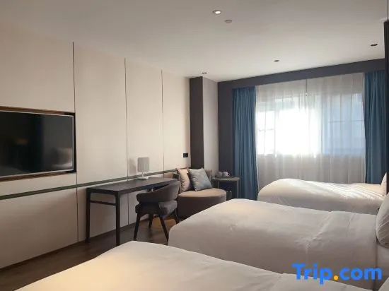Haiyi Hotel - Chambres