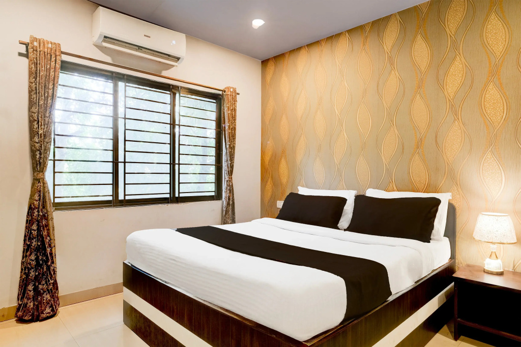OYO Premium Beltola Tiniali - Chambres