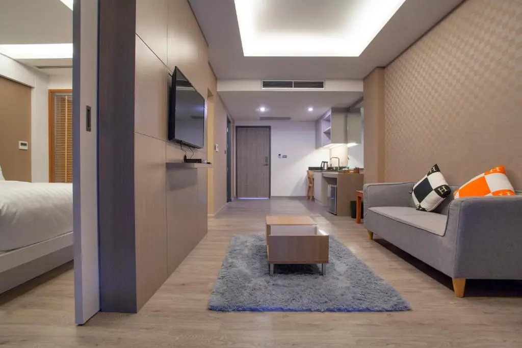 Double Suite with balcony and with pool view full double bed