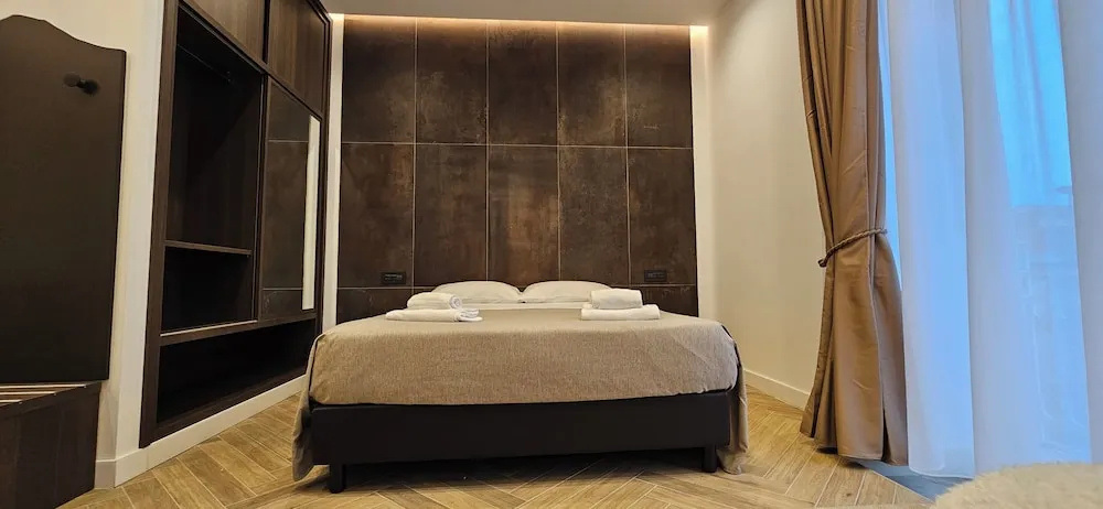 Deluxe Quadruple room with balcony