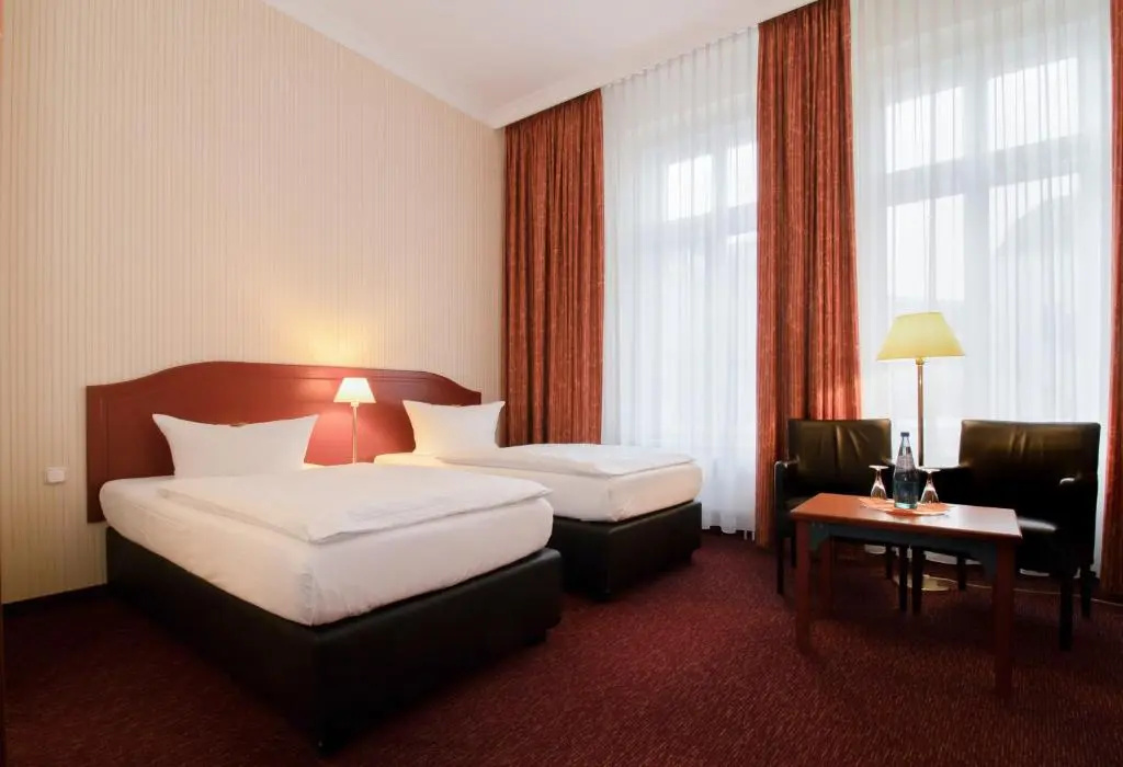 AKZENT Hotel Am Goldenen Strauss - Chambres
