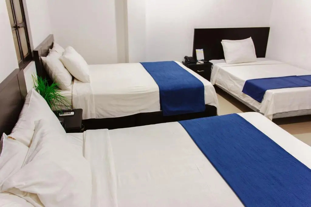 Hotel la Ciudad - Chambres