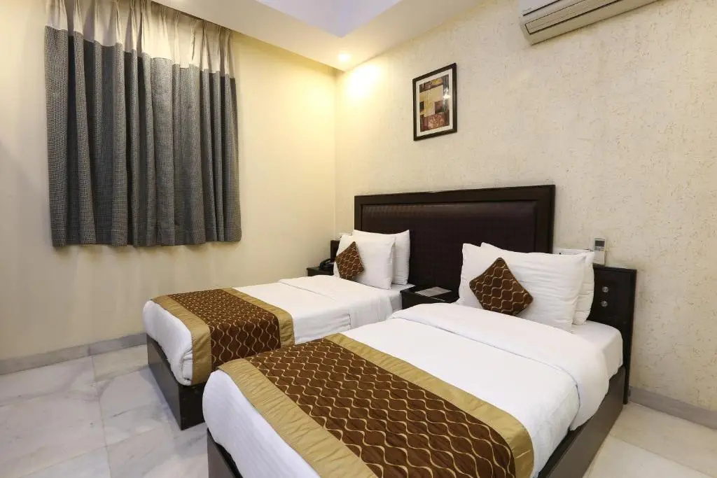 Hotel Rupam Kingston Park - Chambres