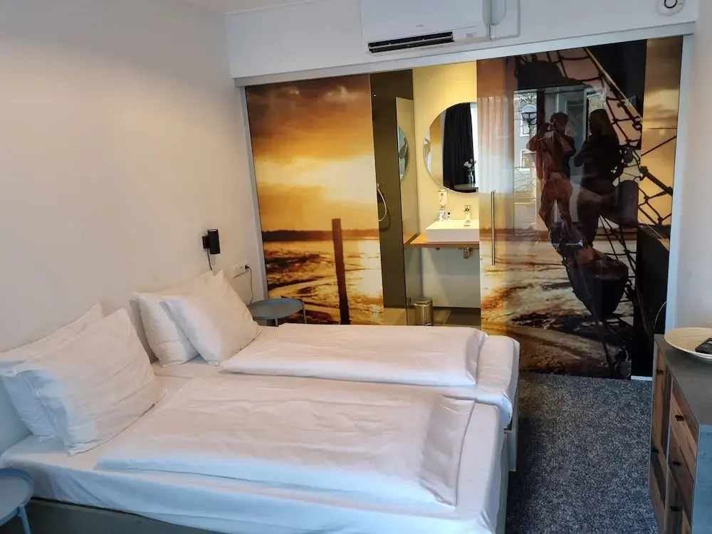 Hotel De Stadsherberg - Chambres