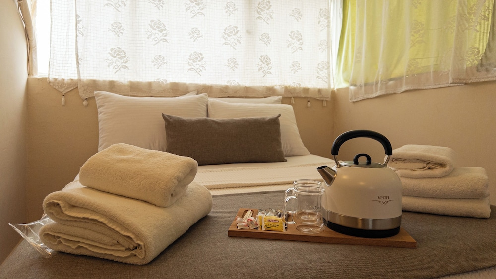 Standard Triple room with partial sea view