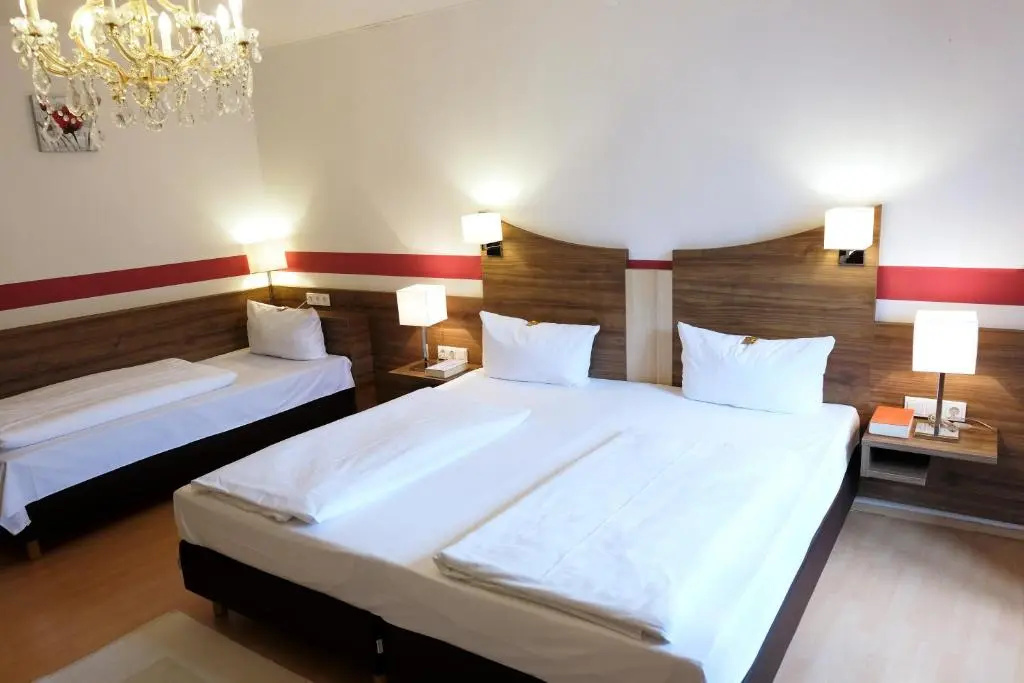 Romantica Hotel Blauer Hecht - Chambres