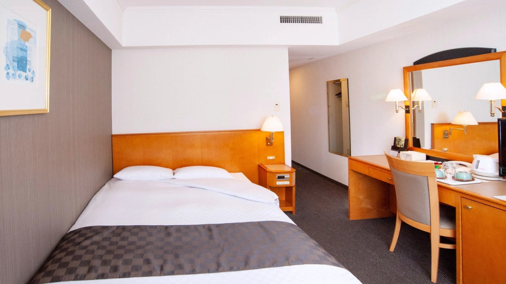 JR Hotel Clement Uwajima - Chambres