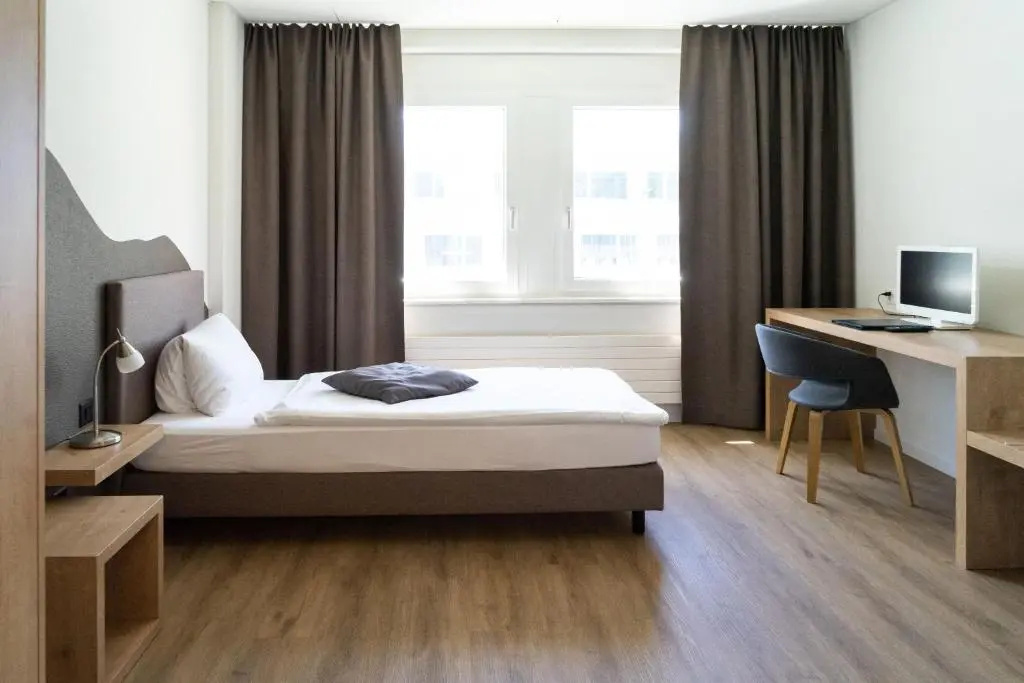 Tailormade Hotel STANS SÜD - Chambres