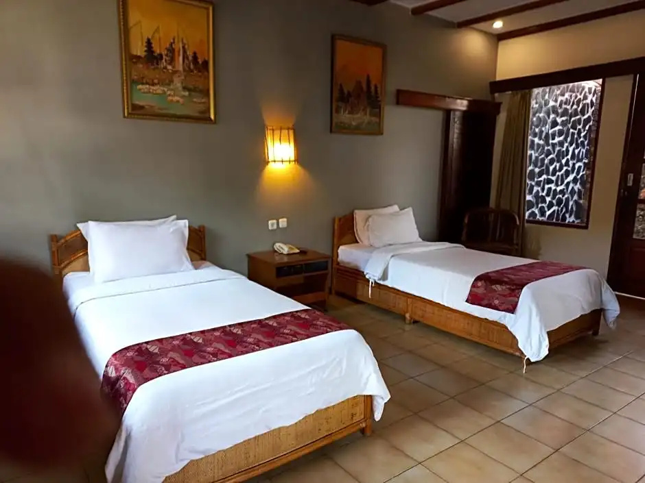 Bali Taman Lovina Resort and Spa Suites - Chambres