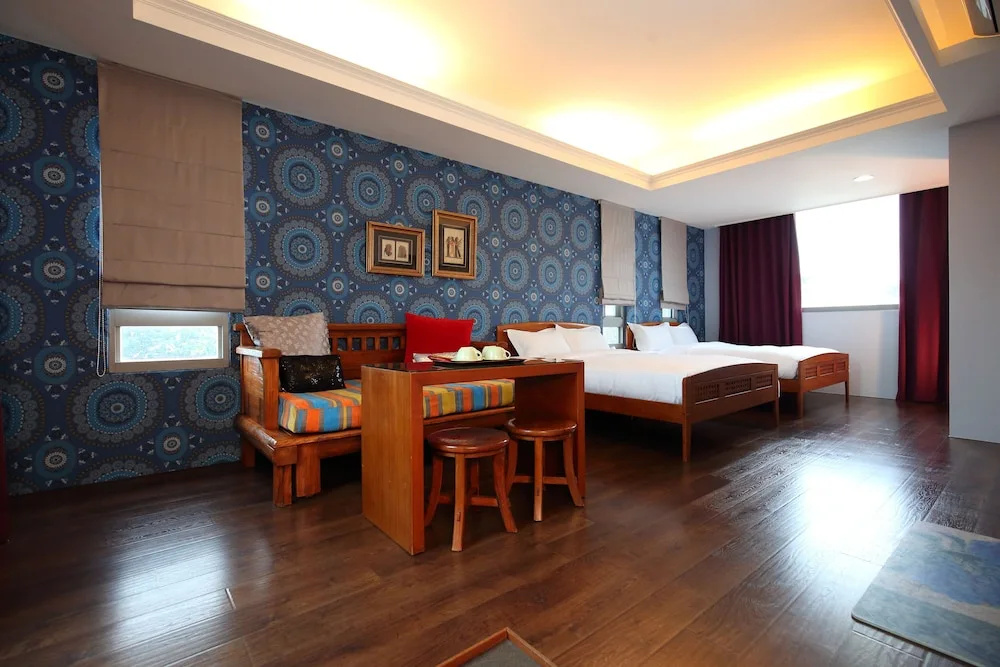 Deluxe Quadruple room with balcony