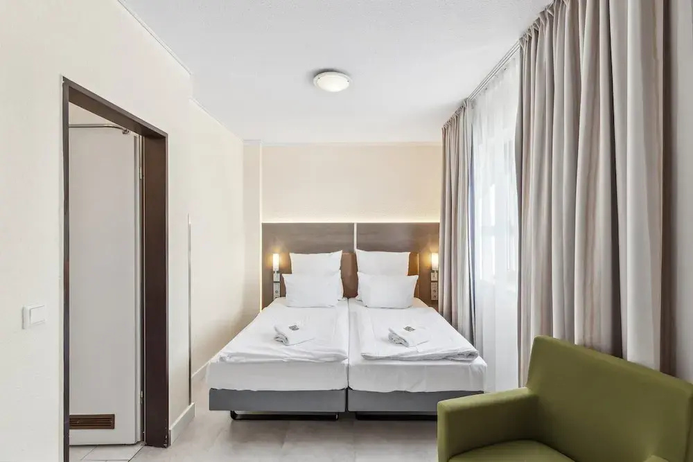 Cityhotel Amadeus - Chambres