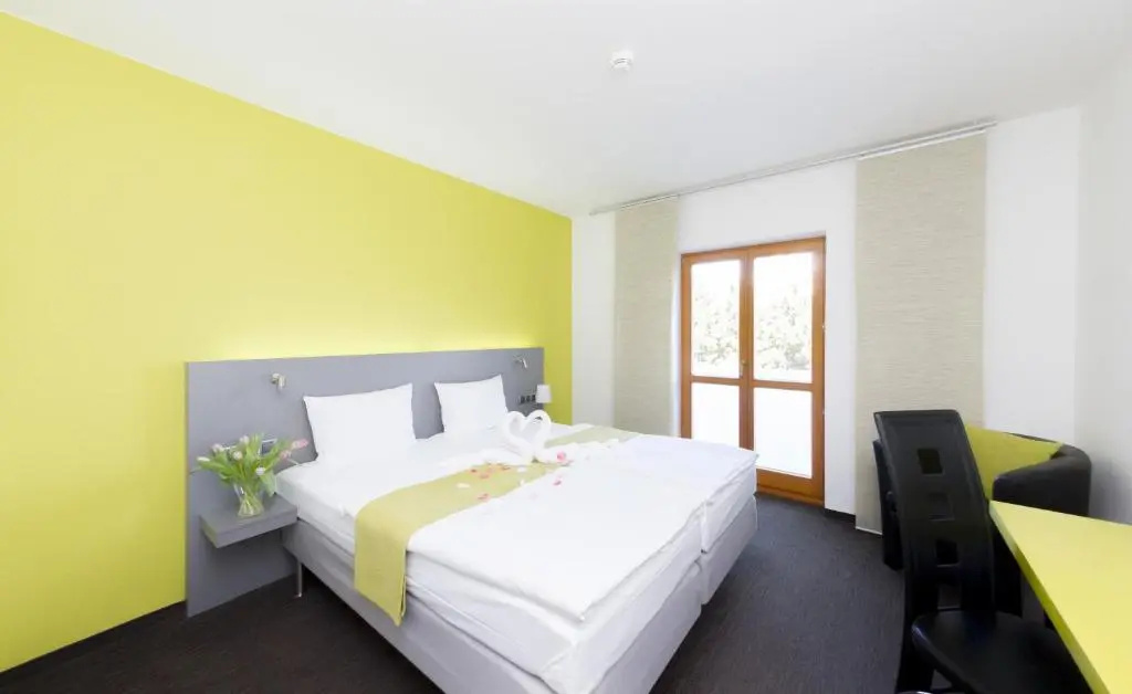 Hotel Herrmes - Chambres