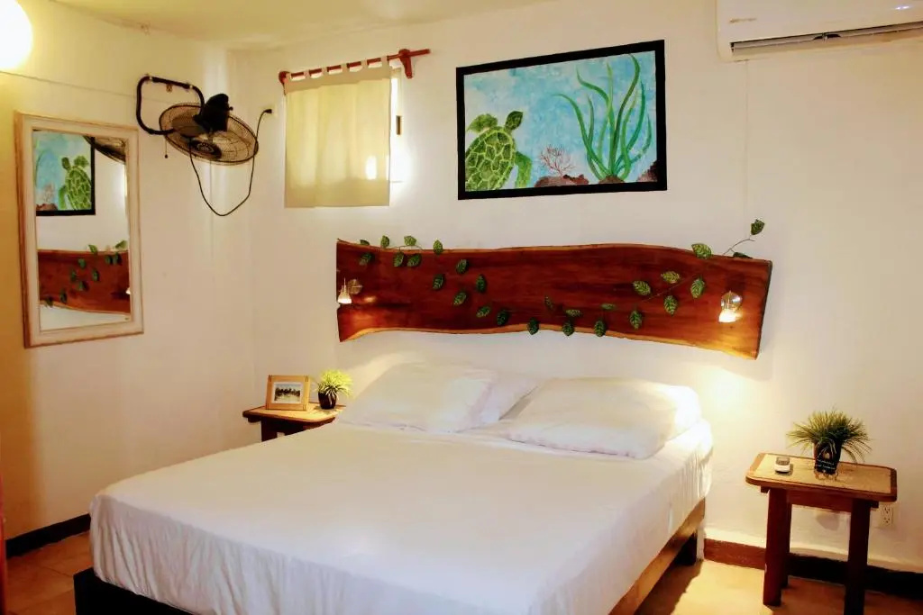 Hostal & Suites Pata de Perro - Chambres