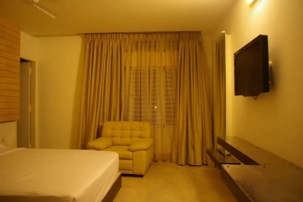 Roseline Suites - A Business Hotel - Chambres
