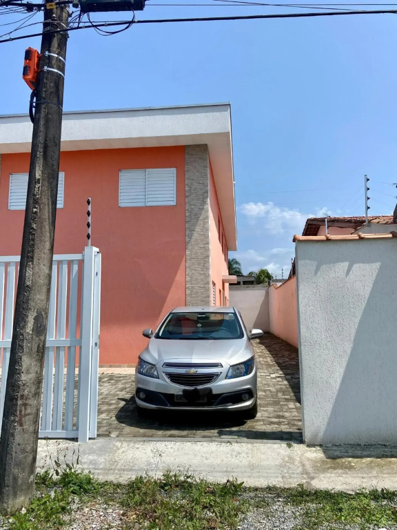 Casa em Bertioga condomínio 250 metros da praia