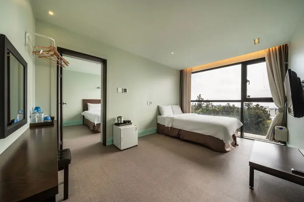 Sunrise Hotel Jungmun - Chambres