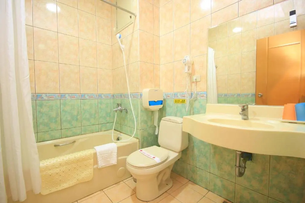 East Commercial Affairs Hotel - Chambres