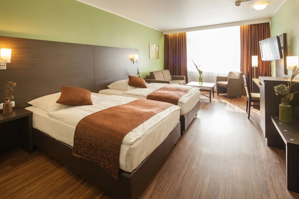 Hotel Mondial - Chambres