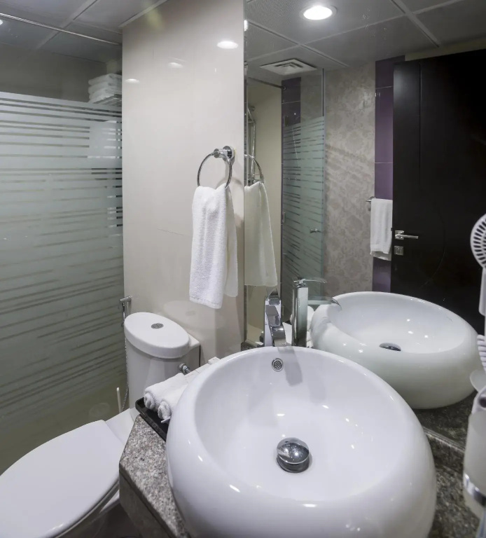 The View Al Barsha Hotel Apartments - Chambres
