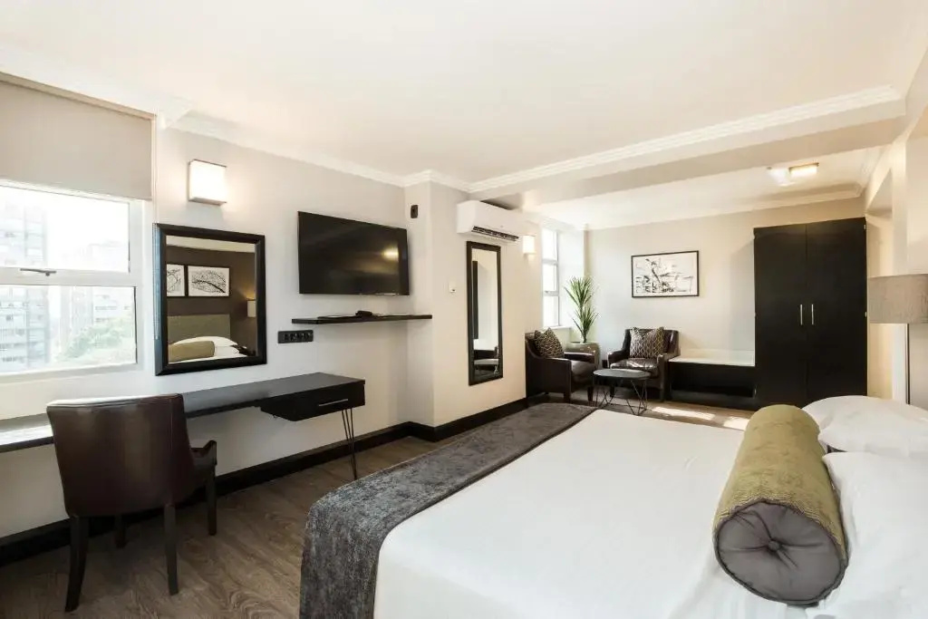 Belaire Suites - Chambres