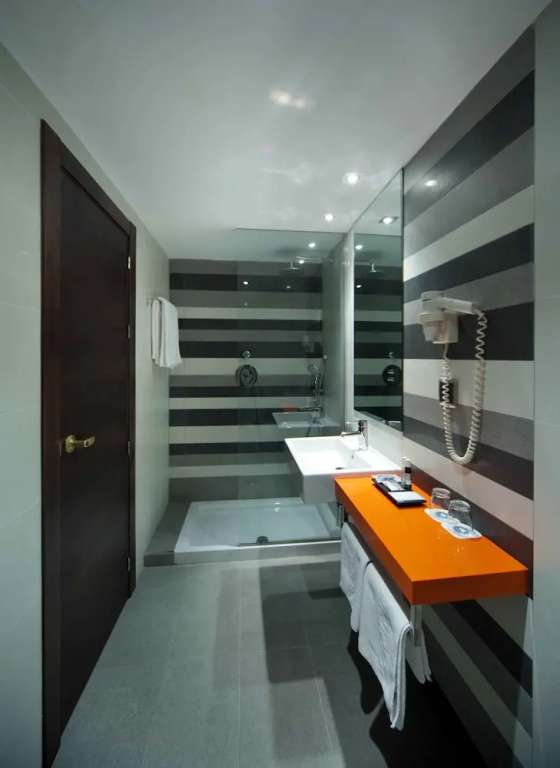 Hotel Nuevo Torreluz - Chambres