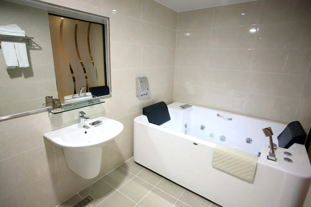 K Tourist Hotel - Chambres