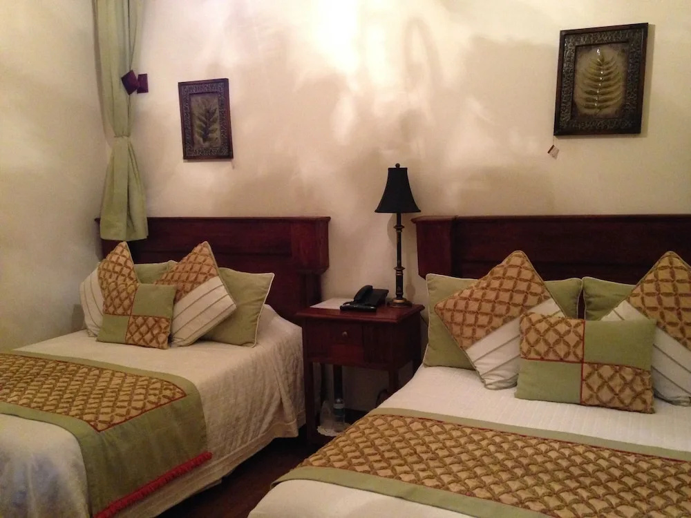 Roka Plaza Hotel Boutique - Chambres