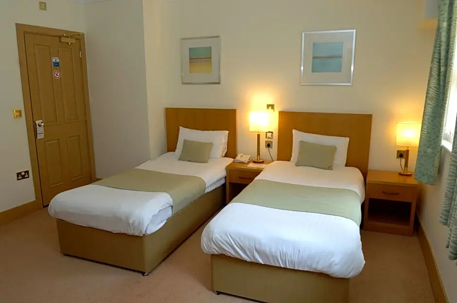 Carousel Hotel - Chambres
