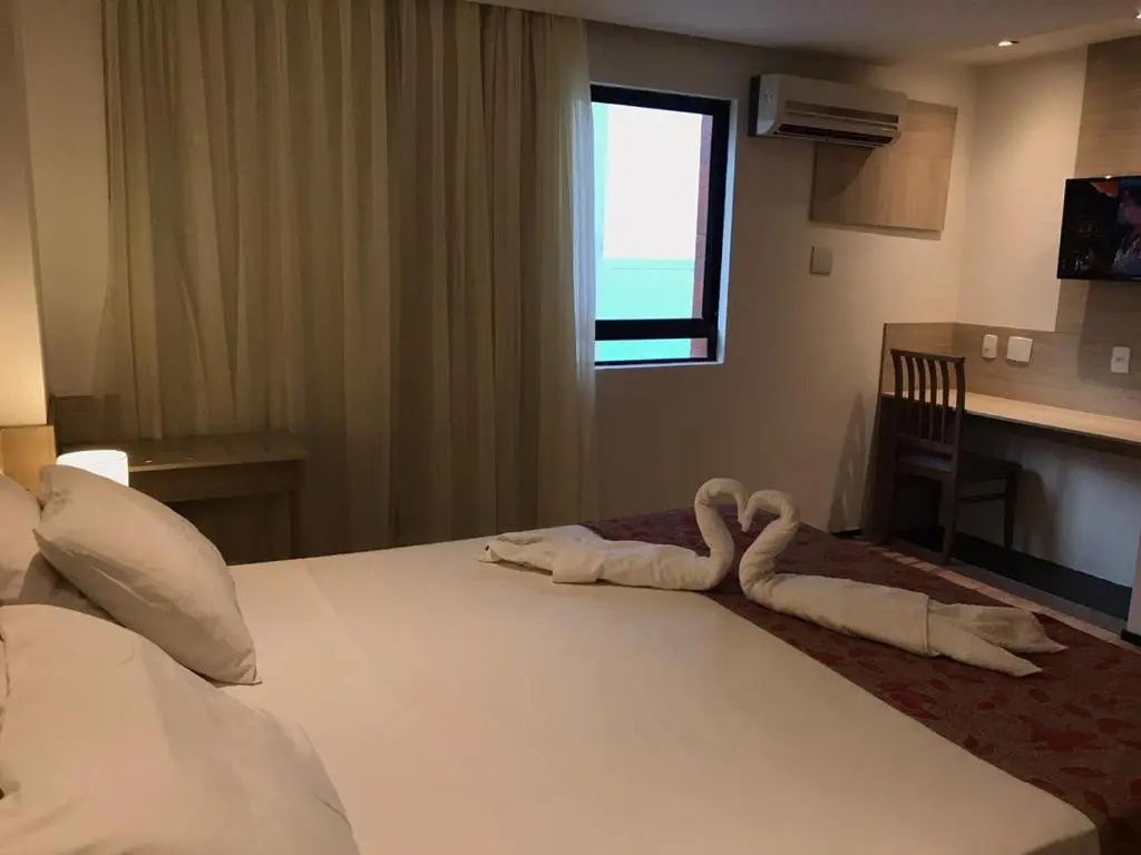 Plaza Praia Suites - Chambres