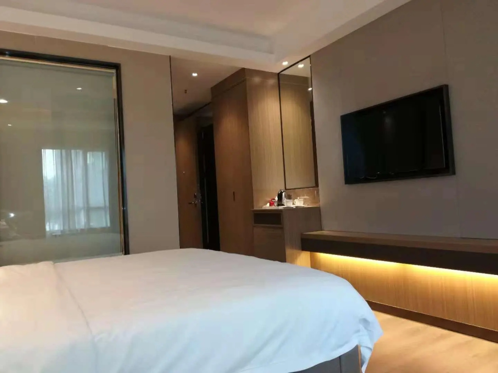 Zhongshan Tegao Business Hotel - Chambres