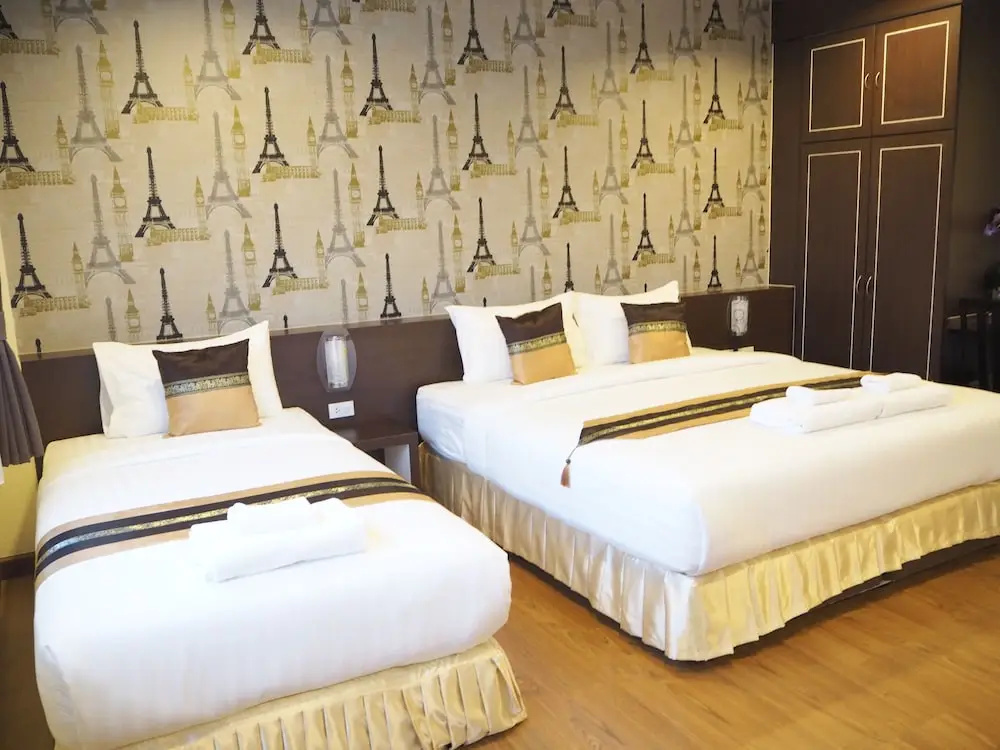 Suksomboon Hotel - Chambres