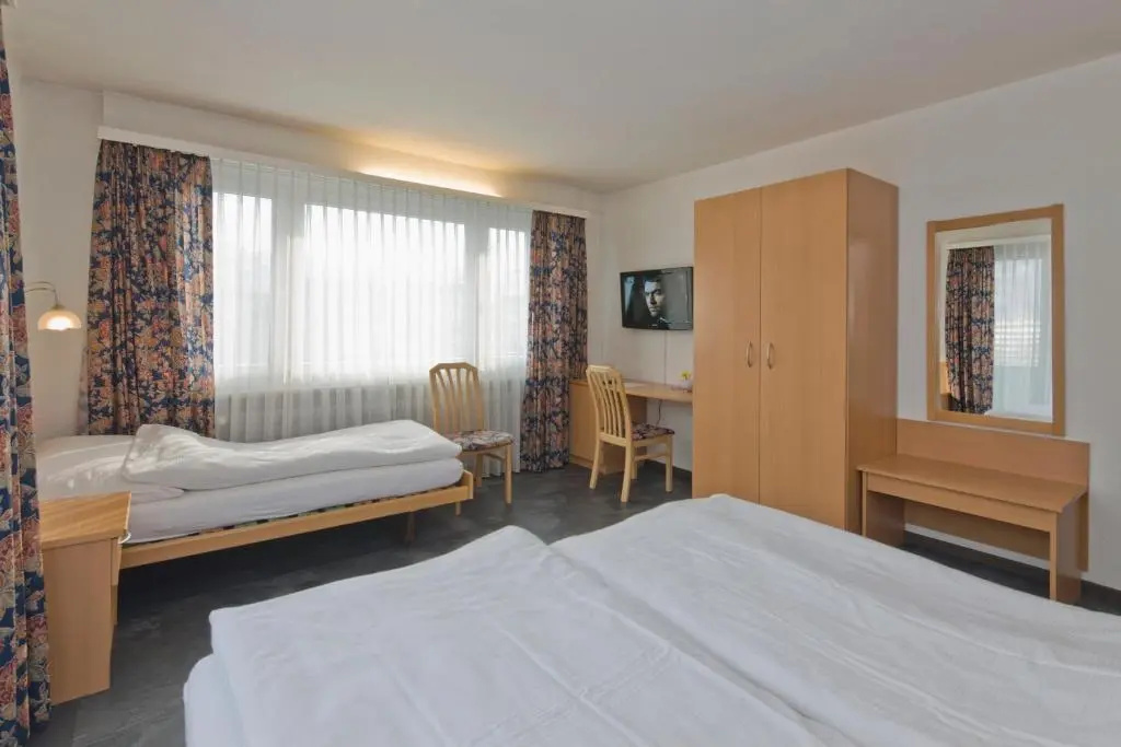 Hotel Europe Garni - Chambres