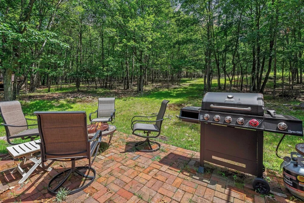 Poconos Escape w/ Game Room, Poker Loft, Fire Pit + Spacious Deck