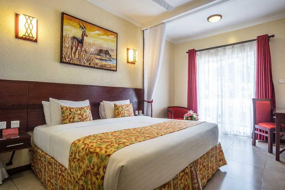 PrideInn Hotel Raphta - Chambres