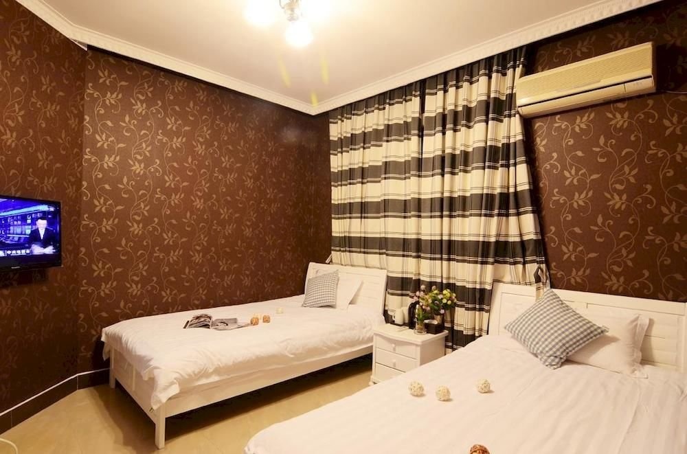 Xiamen Manman Inn