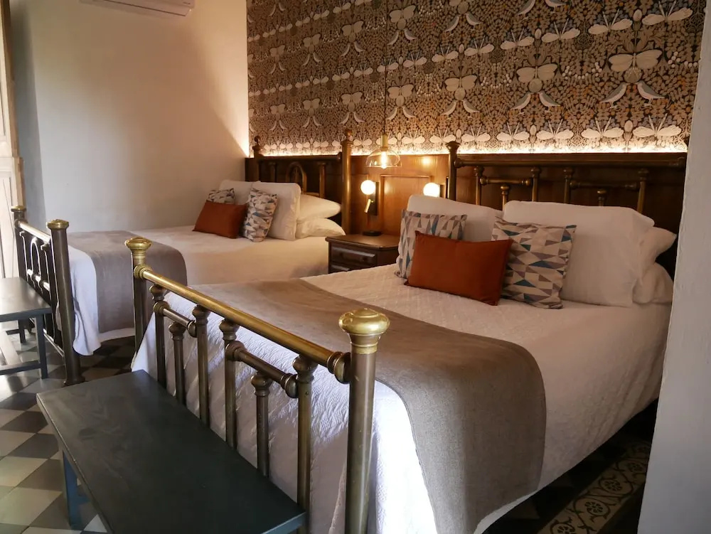 Hotel Hostal El Farol - Chambres