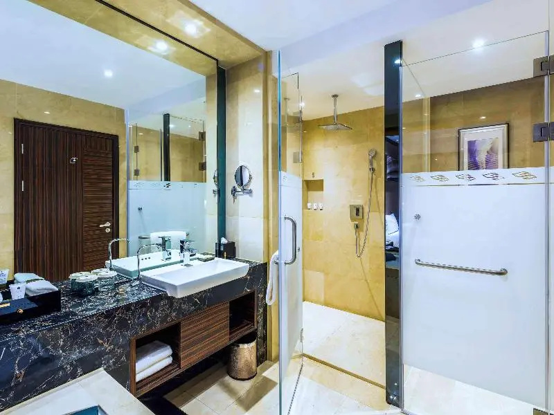 Grand Mercure Qingdao Qinglong - Chambres