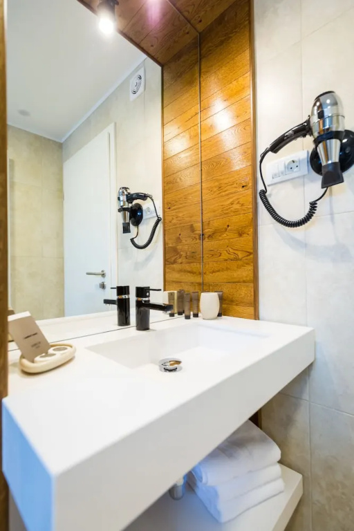 UpperHouse Suites & More Hotel - Chambres