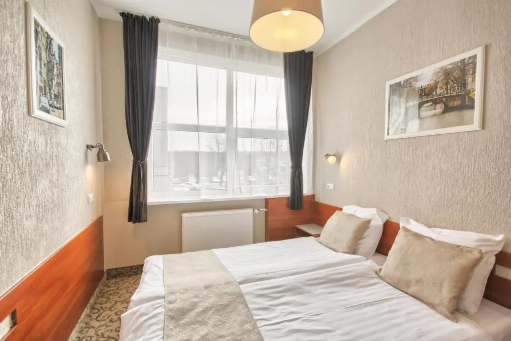 Inza Hotel - Chambres